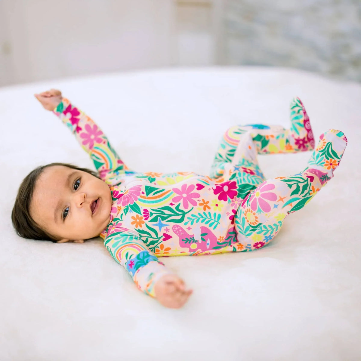 Raising Mama Rainbow Daisy Baby Footie - Colorful Floral Baby Romper - The Palm Beach Baby