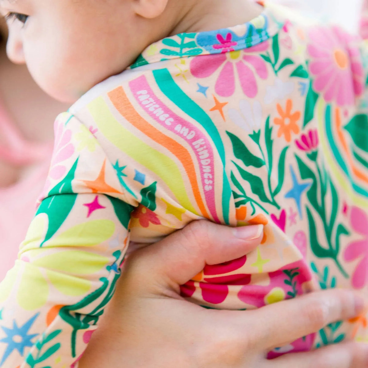 Raising Mama Rainbow Daisy Baby Footie - Colorful Floral Baby Romper - The Palm Beach Baby