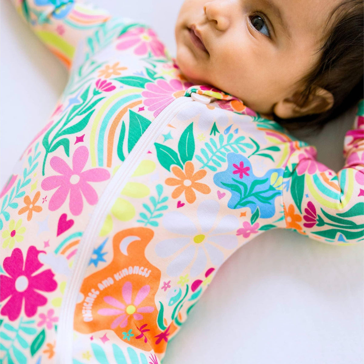 Raising Mama Rainbow Daisy Baby Footie - Colorful Floral Baby Romper - The Palm Beach Baby