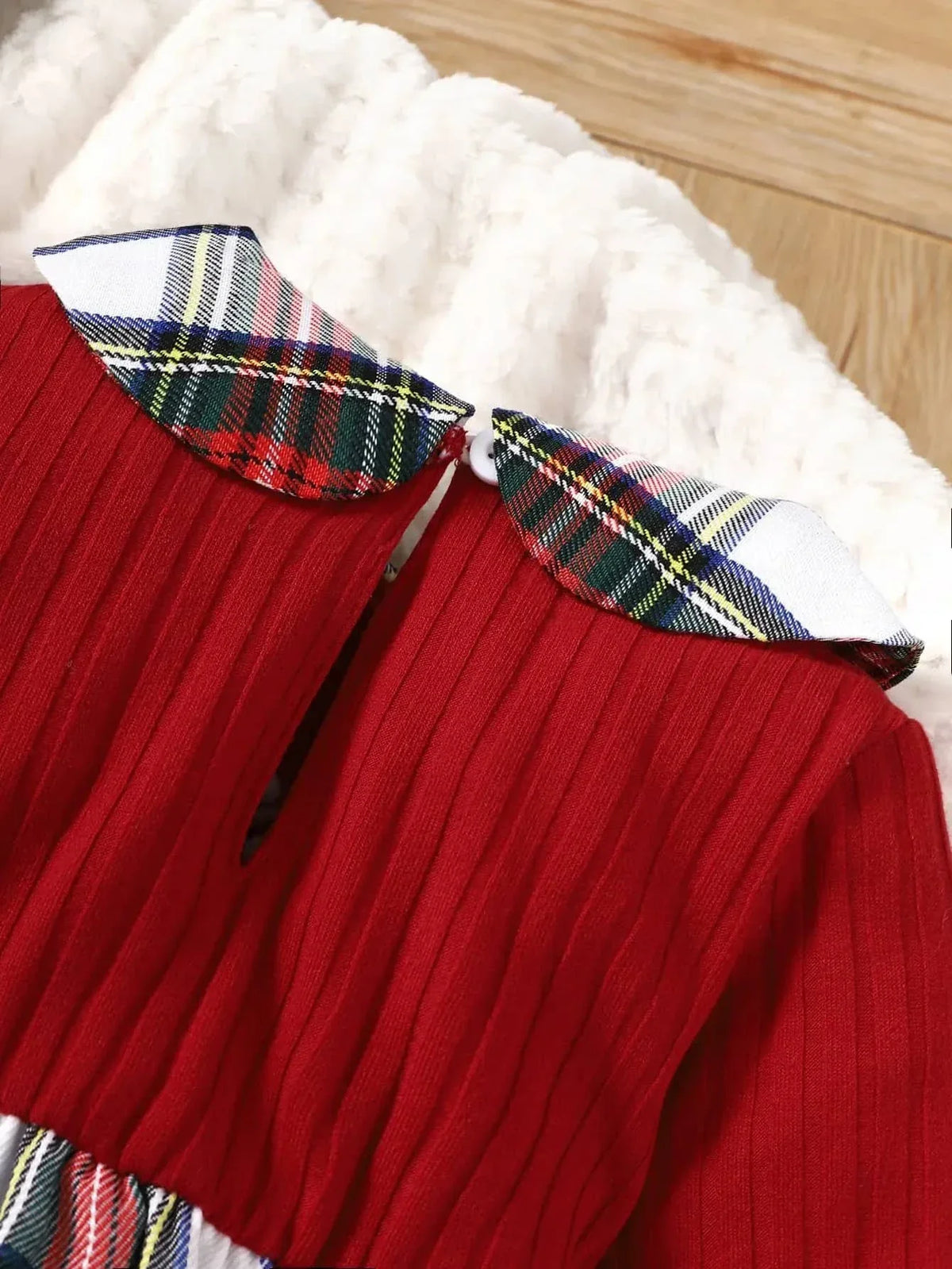 close-up of red plaid girls dress with ribbed knit bodice and plaid collar for toddlers
