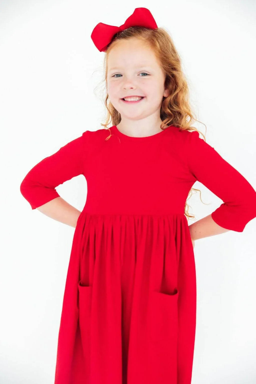Red twirl dress for girls by Mila Rose, sleeves with pockets for kids