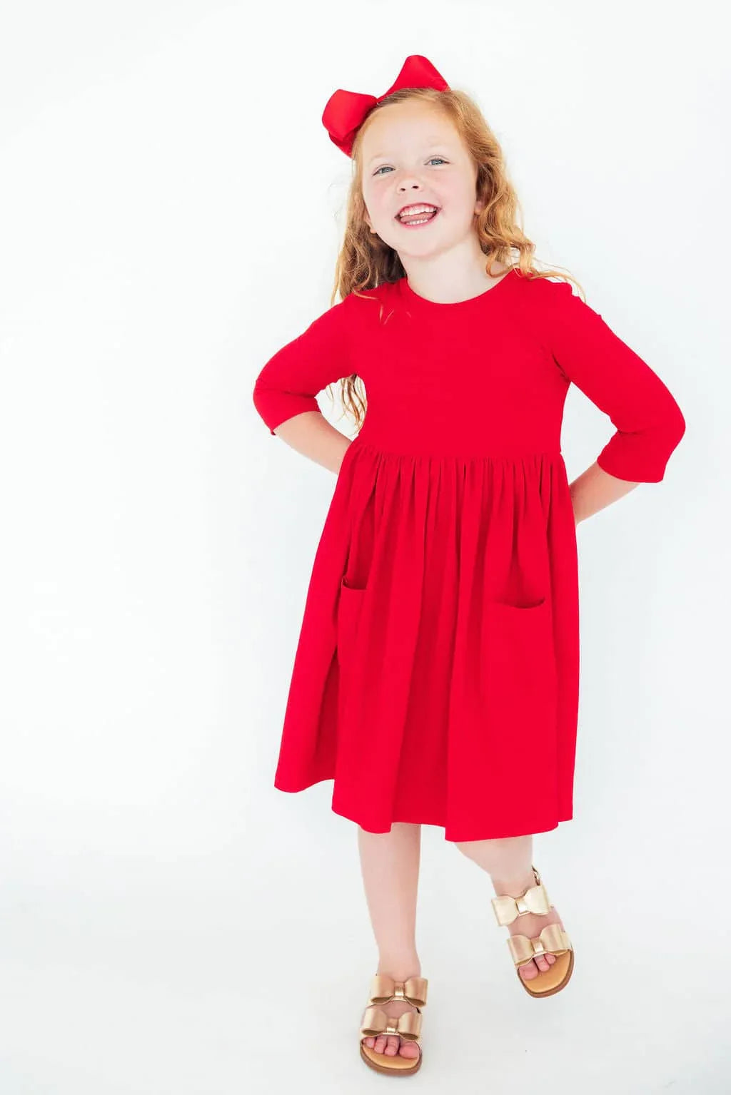 Red twirl dress for girls with  sleeves and pockets, size suitable for kids