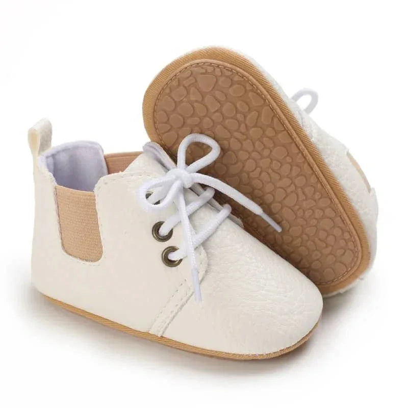 white retro baby lace-up shoes for infants with soft soles and elastic side panels