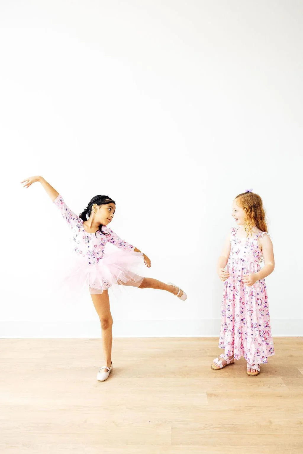 Girls pink retro tutu leotard for little girls with floral print and 3/4 sleeves by Mila Rose