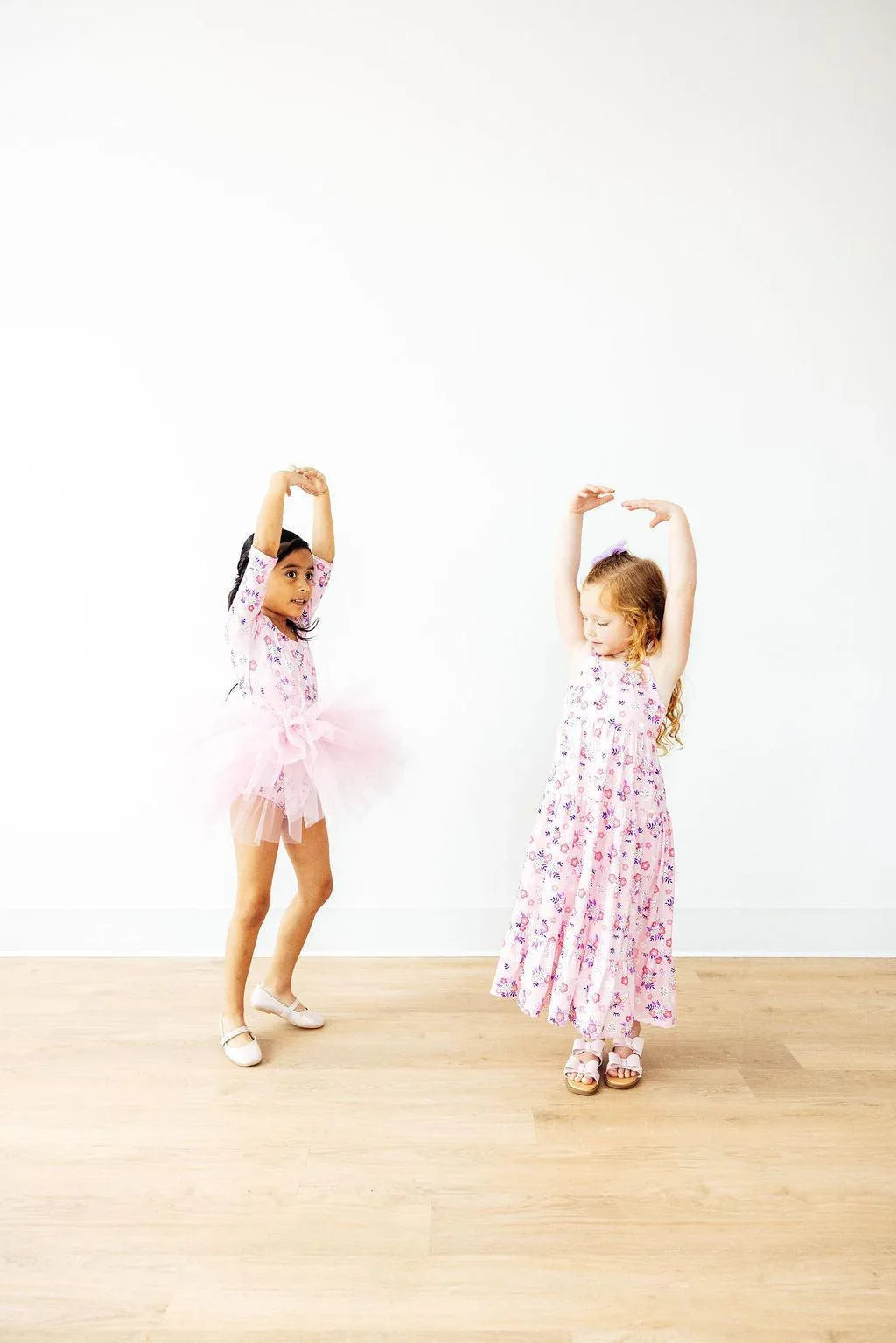 Girls pink retro tutu leotard for little girls with floral patterns in toddler sizes