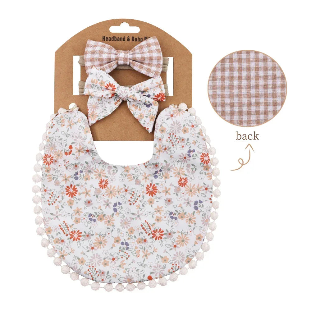 floral and brown plaid reversible baby bib and headband set for infants on packaging
