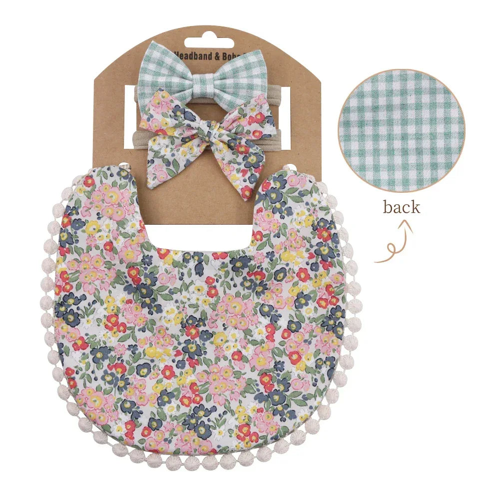 Floral and green gingham reversible baby bib and headband set for infants with pom pom trim
