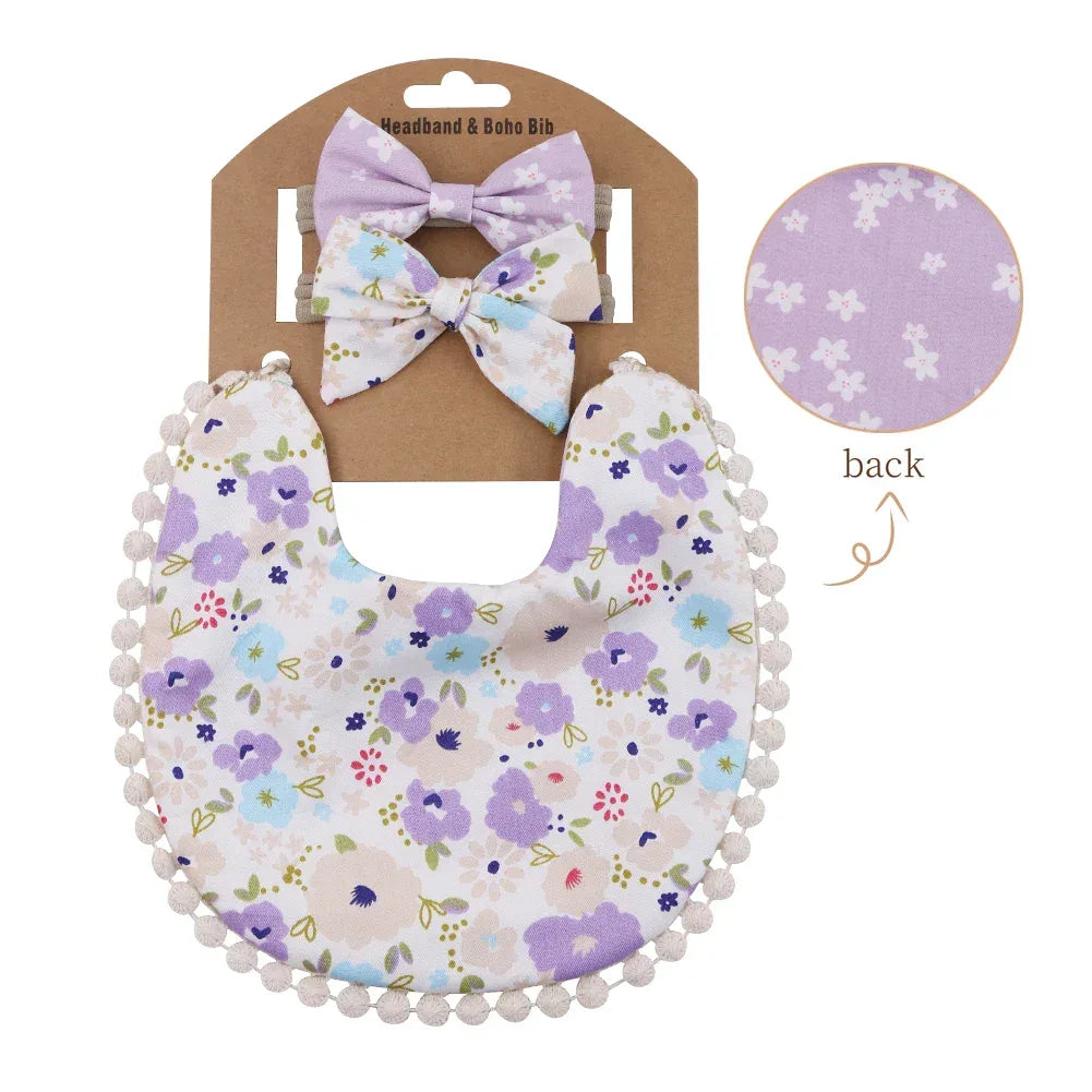 Reversible baby bib and headband set with purple floral pattern and pompom trim for infants
