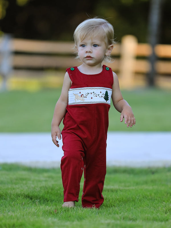 Red baby boys smocking romper with embroidered Christmas tree dog design, perfect for festive holiday photos and gatherings.