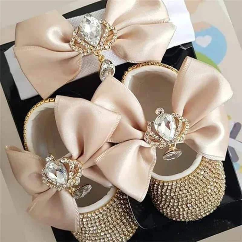 Beige rhinestone first walker baby shoes with large satin bows and crystal crown decorations for infant girls