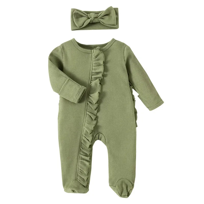 Green ribbed knit baby romper with headbow designed for infants