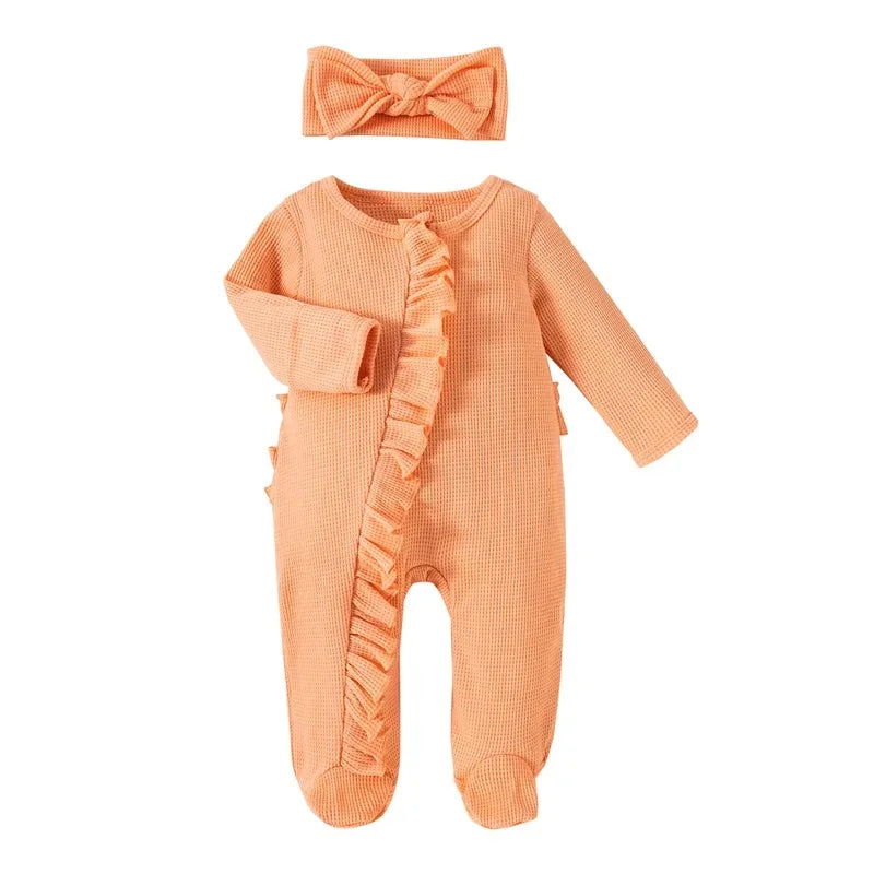 peach ribbed knit baby romper with headbow for infant featuring ruffle detail