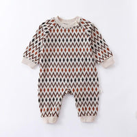 baby romper with brown and black diamond pattern, long sleeve, beige trim, newborn size