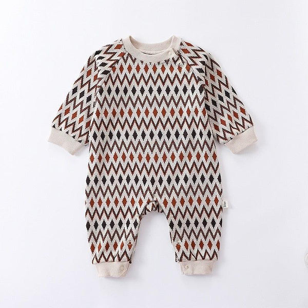 baby romper with brown and black diamond pattern, long sleeve, beige trim, newborn size