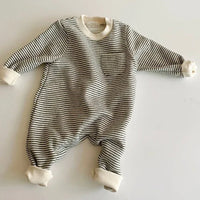 baby striped romper in black and white with long sleeves and chest pocket for infants