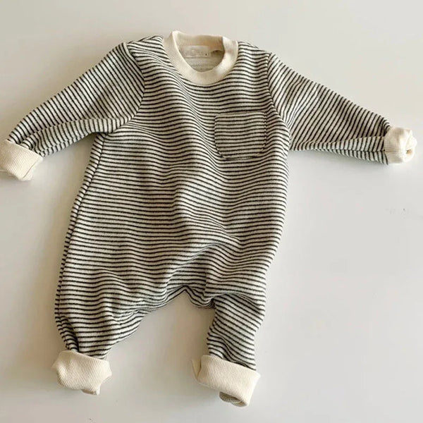 Beige and black striped romper for babies with long sleeves and chest pocket