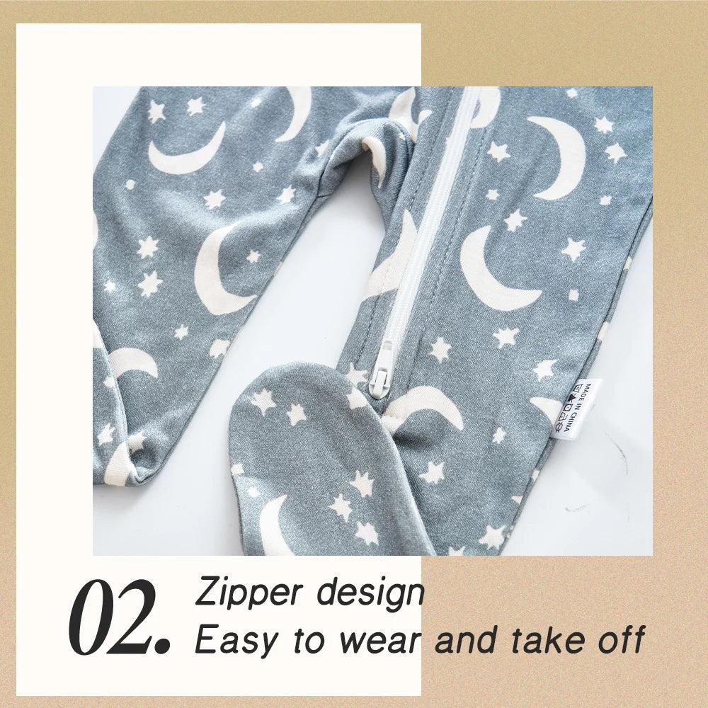 Baby blue romper with moon and star print, zipper design, and footed style for easy wear