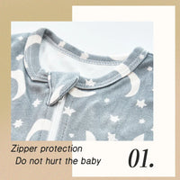 baby romper in gray with white moon and star print and zipper protection for newborns