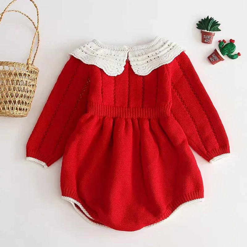 Red baby romper with long sleeves and white scalloped collar for infants