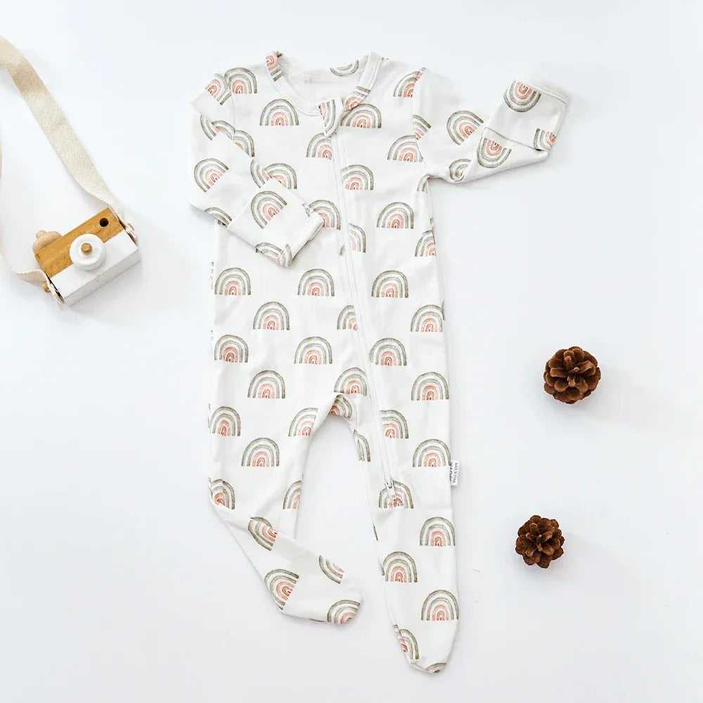 baby white romper with muted rainbow print, long sleeve footed pajamas for infants