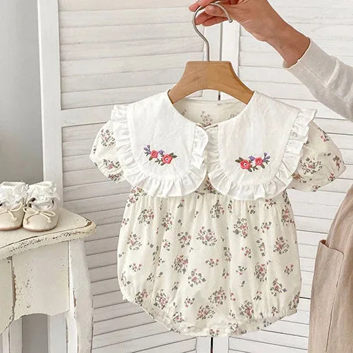 baby cream floral rompers with large white embroidered collar and puff sleeves