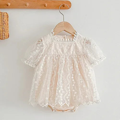 baby white lace romper with puff sleeves and scalloped edges for infants