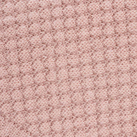 Goosewaddle rose knit baby blanket in soft pink for newborns with textured knit pattern