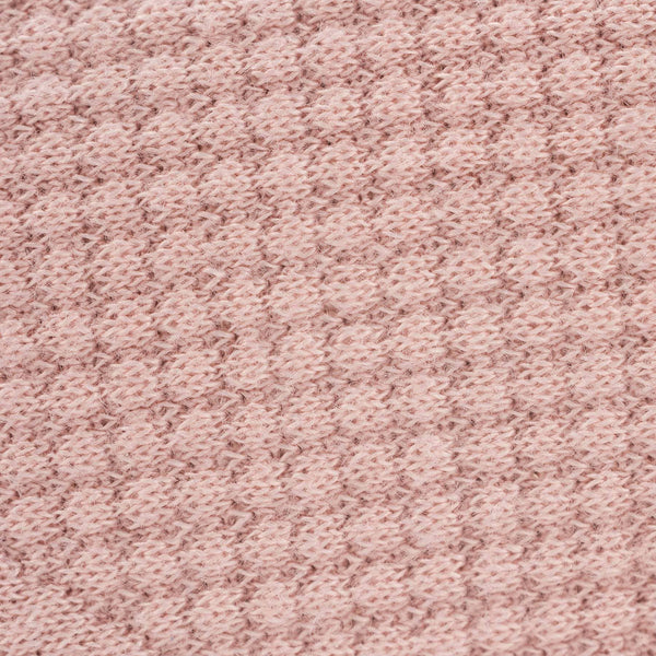 Goosewaddle rose knit baby blanket in soft pink for newborns with textured knit pattern
