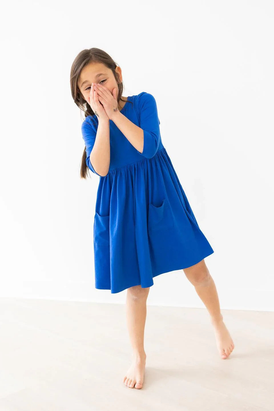 Girls royal blue twirl dress for girls with 3/4 sleeves and pockets by Mila & Rose
