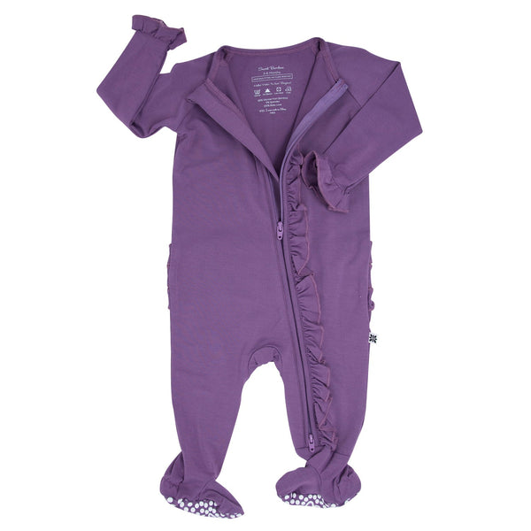 Deep purple ruffle footie with 2-way zipper, silky bamboo fabric, and no-slip dot grips on foot pads.