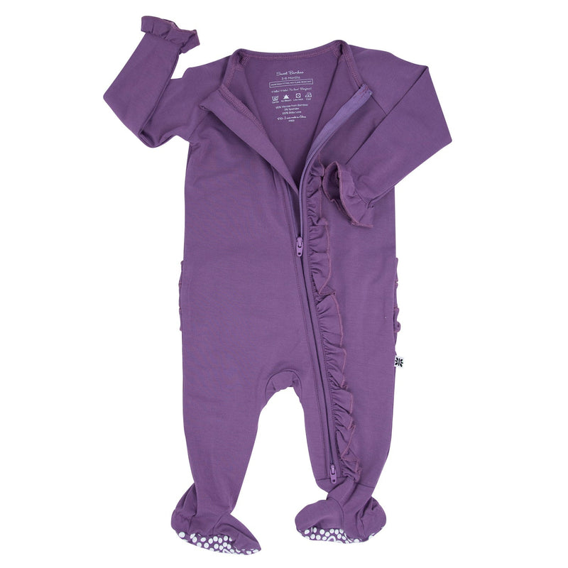 Deep purple ruffle footie with 2-way zipper, silky bamboo fabric, and no-slip dot grips on foot pads.