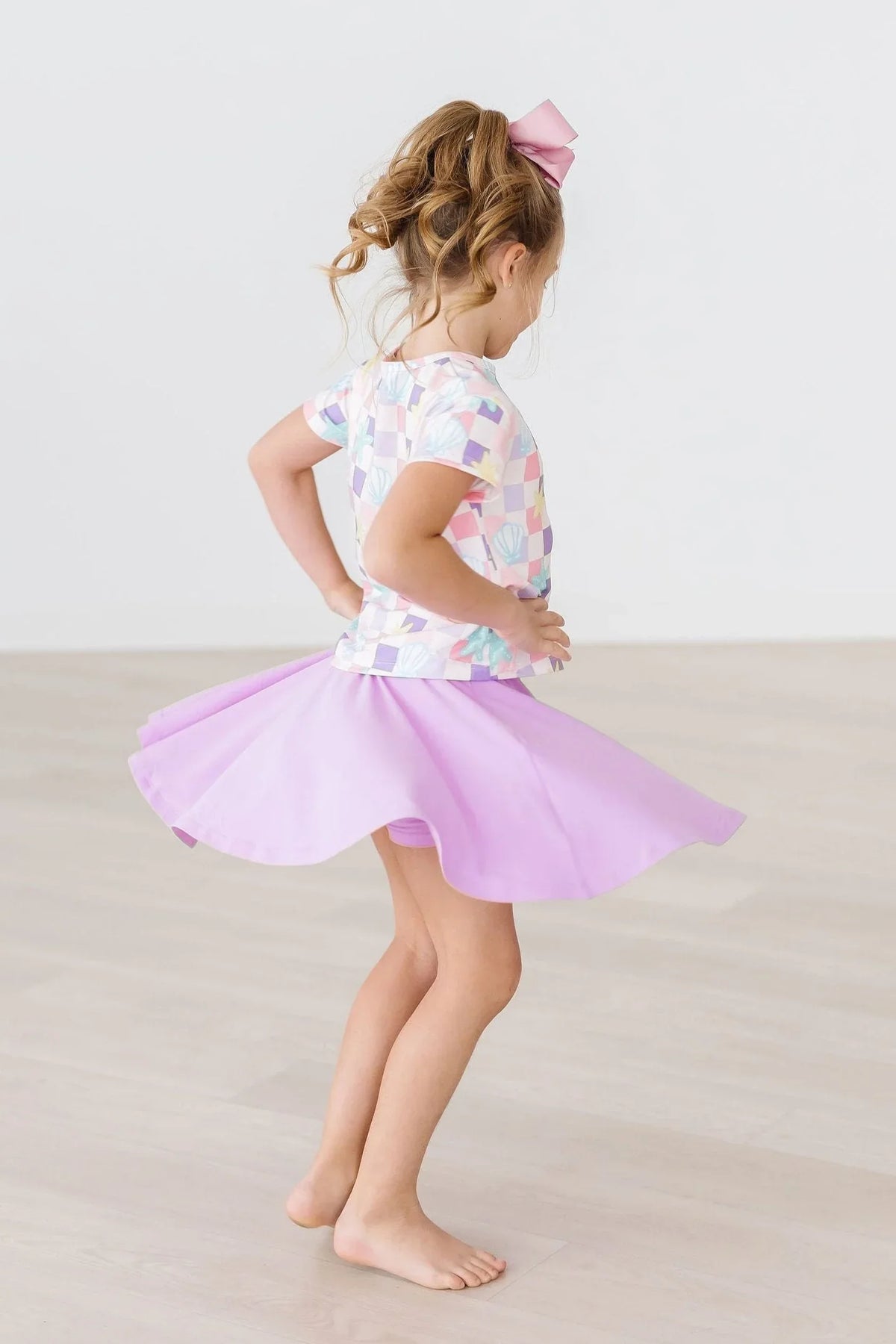 girls pastel geometric ruffle pocket tee, short sleeve with light pink twirling skirt