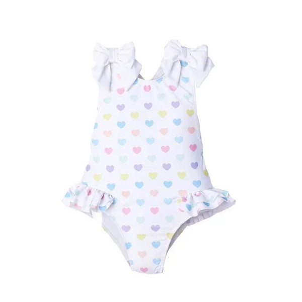 White ruffled heart print toddler swimsuit with pastel hearts and bow shoulder straps