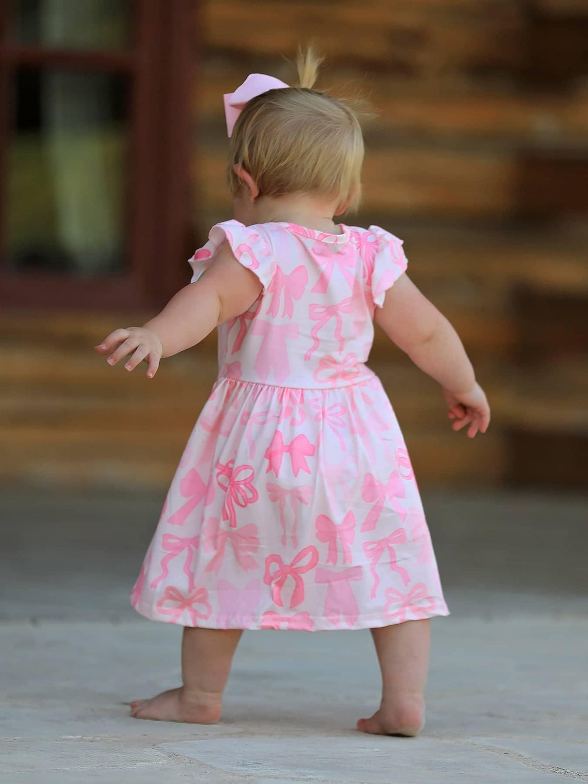 Rylee Faith Designs Bow Print Girls Dress - Pink Ruffle Sleeve - The Palm Beach Baby