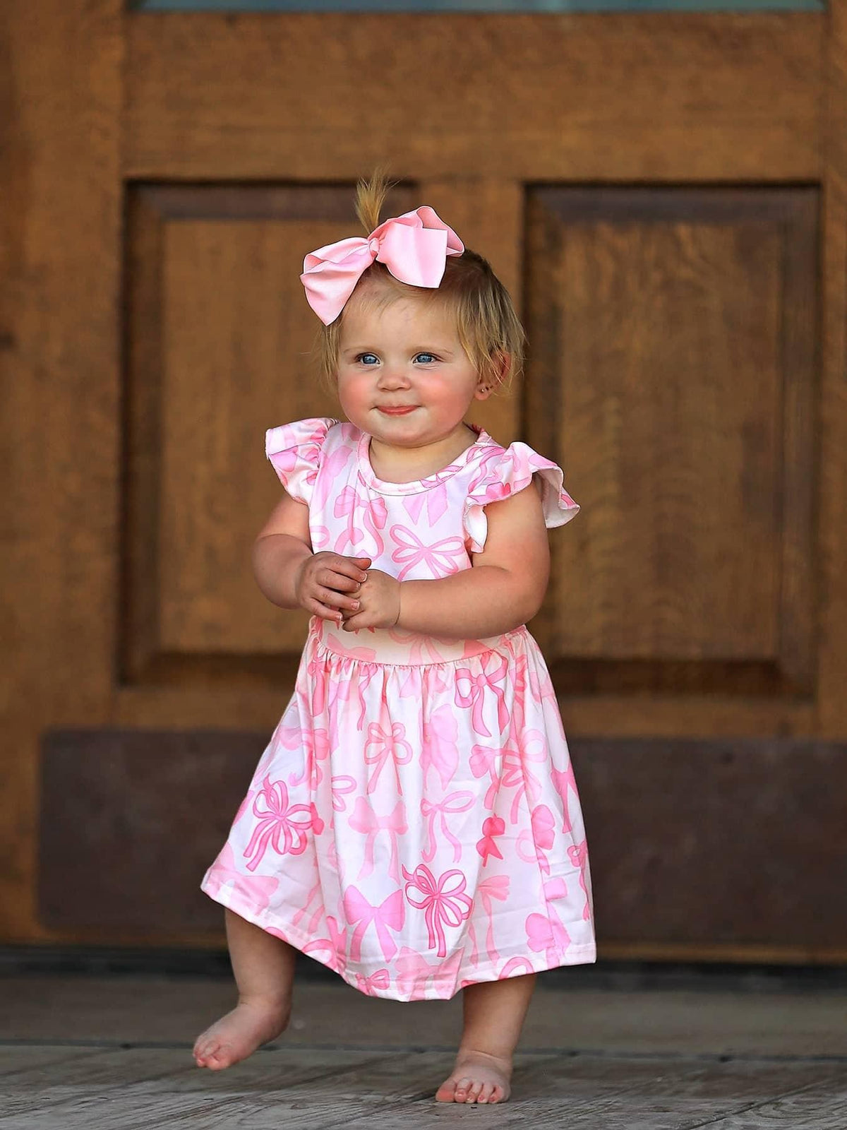 Rylee Faith Designs Bow Print Girls Dress - Pink Ruffle Sleeve - The Palm Beach Baby