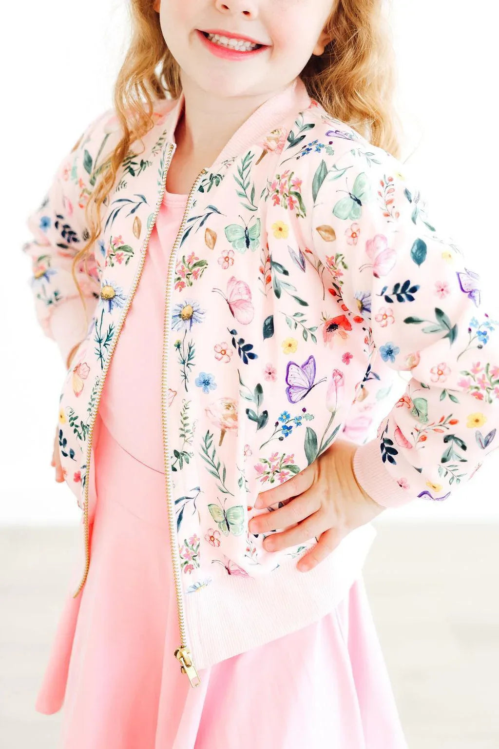 Girls floral print satin jacket with pink trim and long sleeves by Mila & Rose