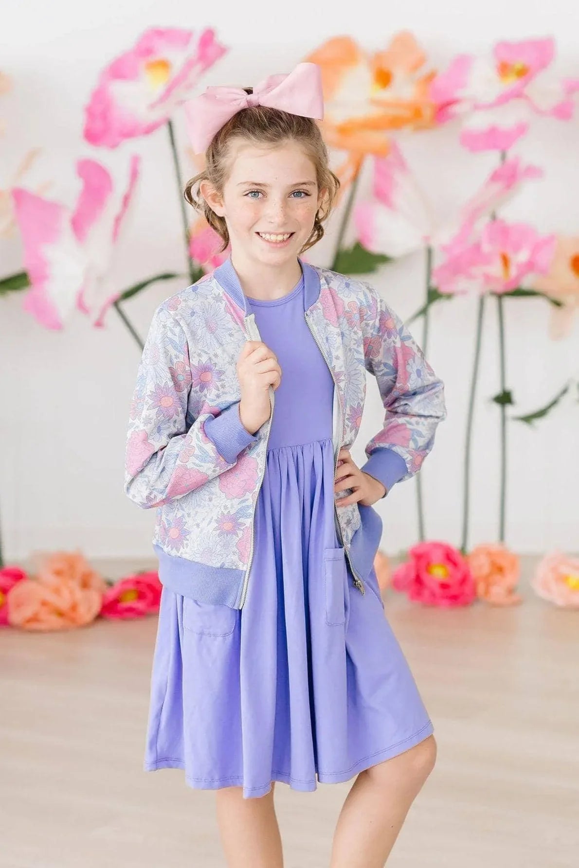 Girls pastel blue and pink shimmer satin jacket with floral pattern and ribbed cuffs