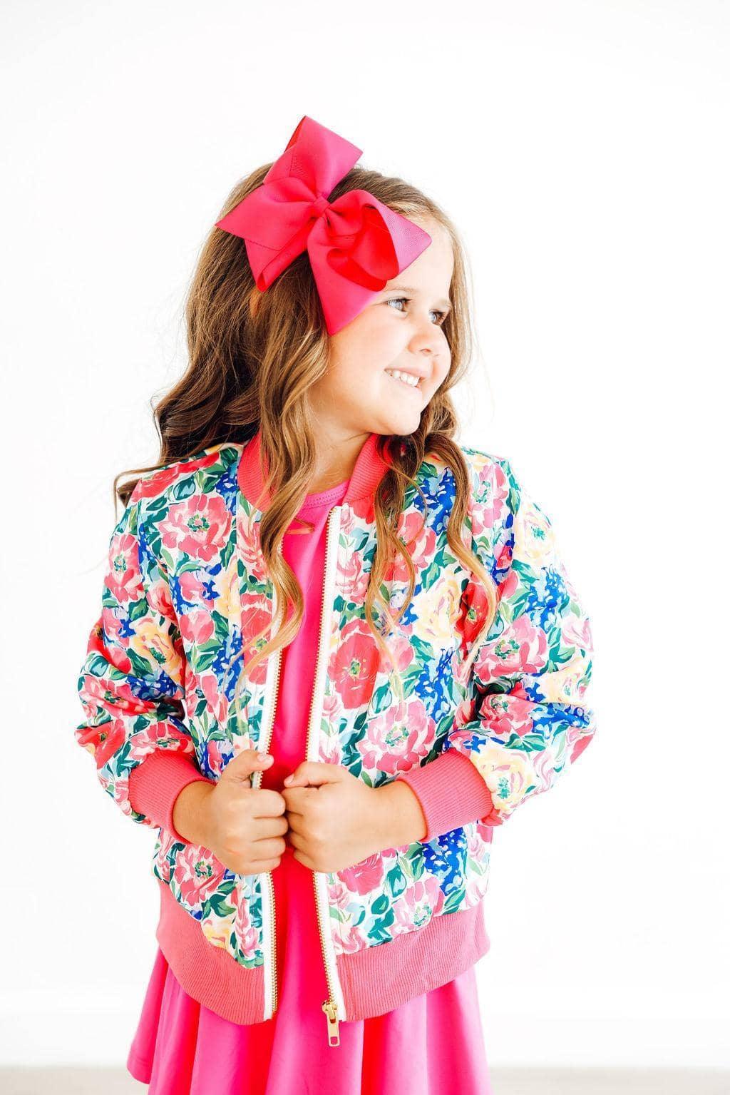 Girls floral satin jacket with pink cuffs and collar, size for young children, colorful vibrant design