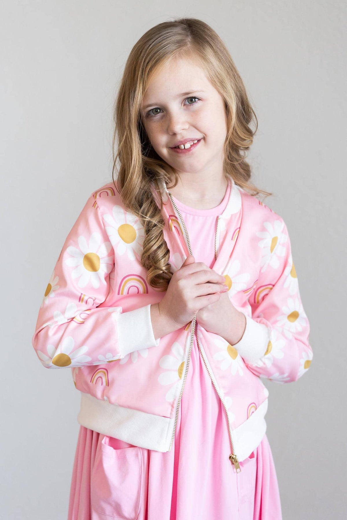 Girls pink satin jacket with white daisy and rainbow print, long sleeve by Mila & Rose