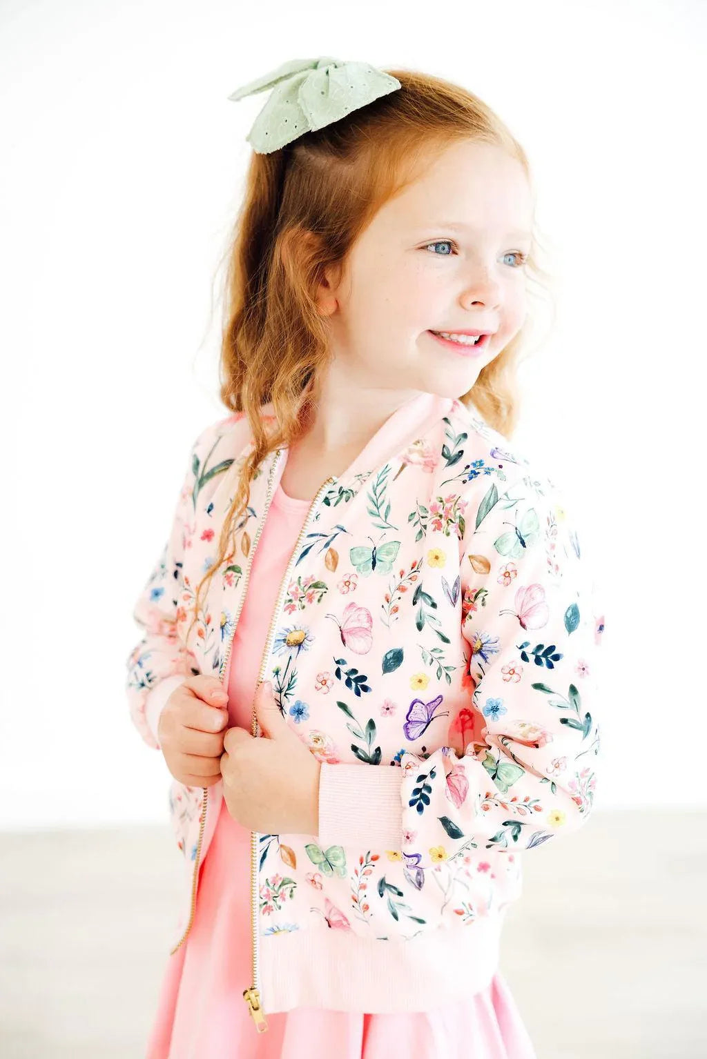 girls floral print satin jacket with pink cuffs and collar, long sleeve by Mila & Rose