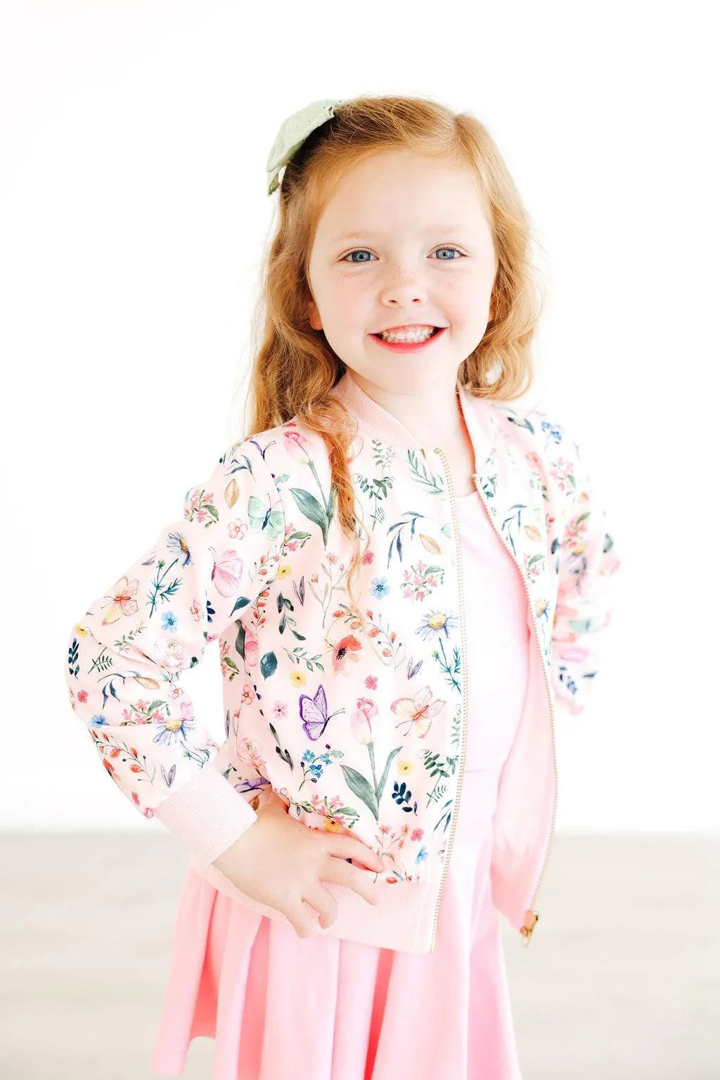 Girls floral print satin jacket by Mila & Rose with long sleeves and pastel colors