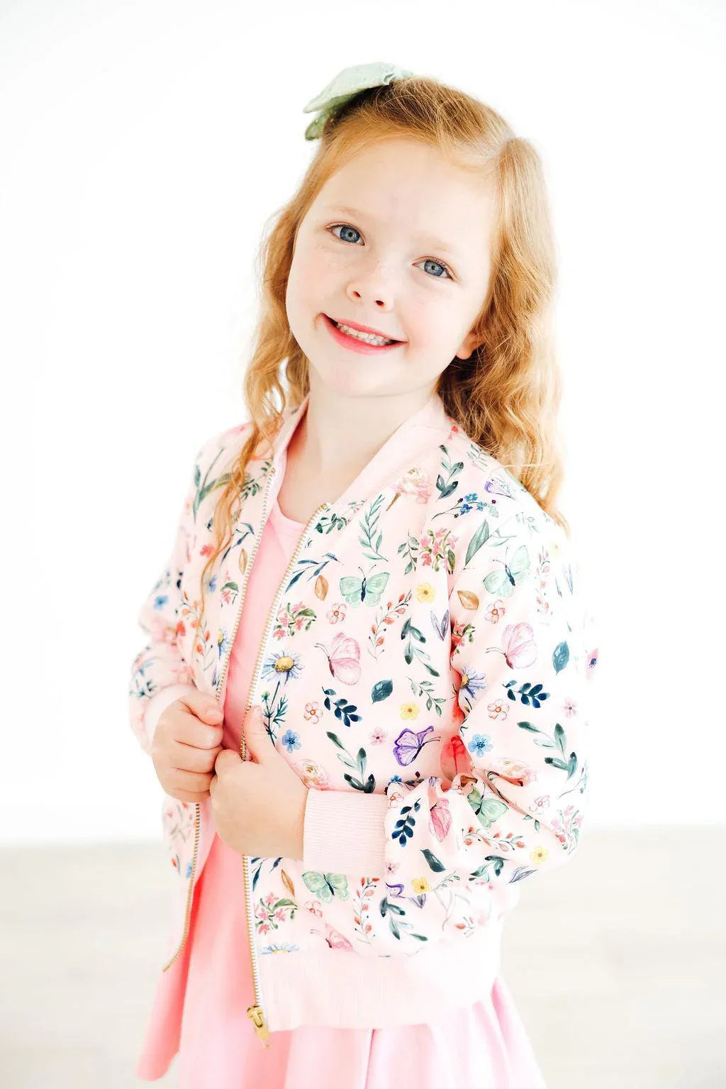 girls pink floral satin jacket with ribbed cuffs and collar by Mila and Rose