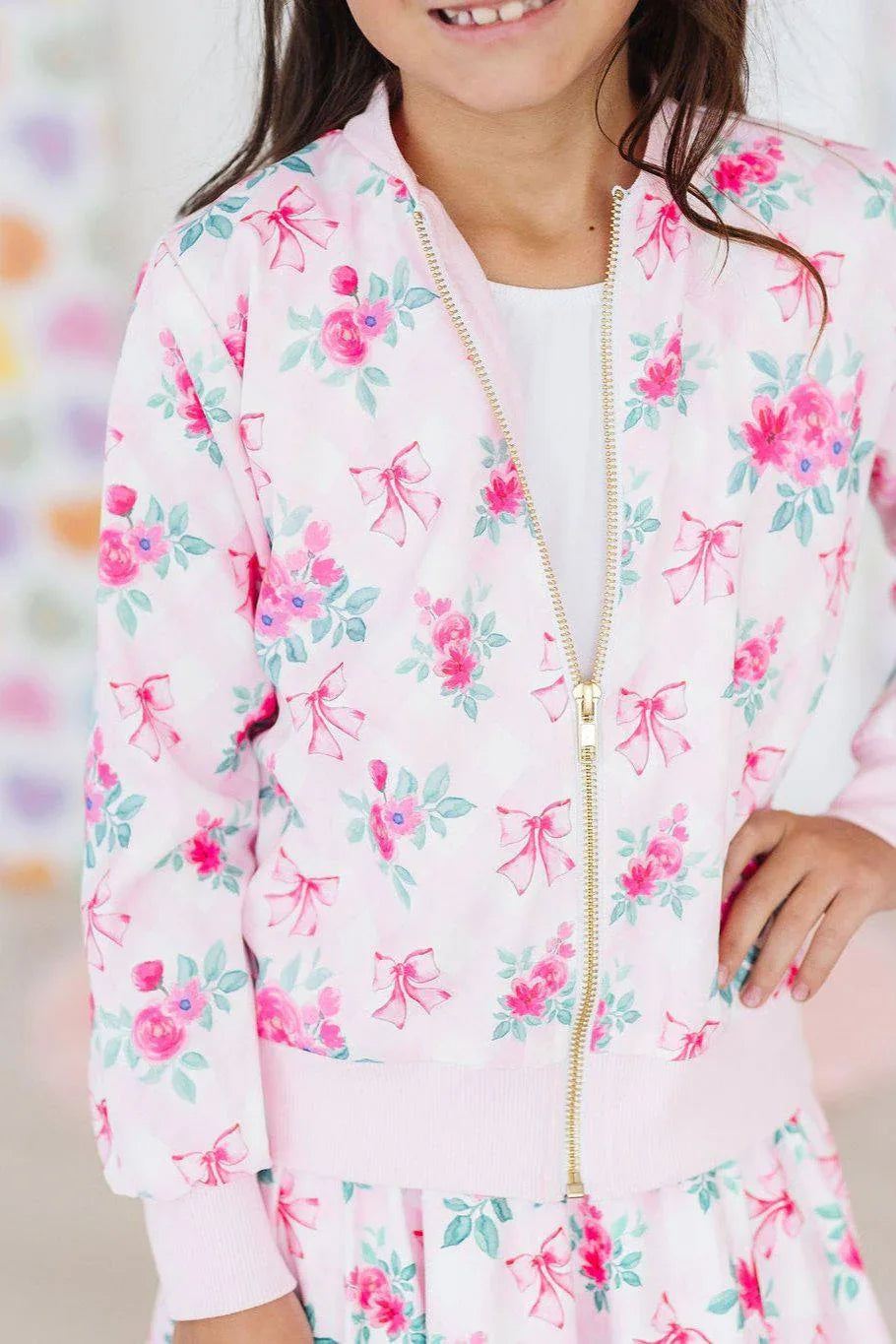 Girls pink floral satin jacket with gold zipper and long sleeves by Mila & Rose