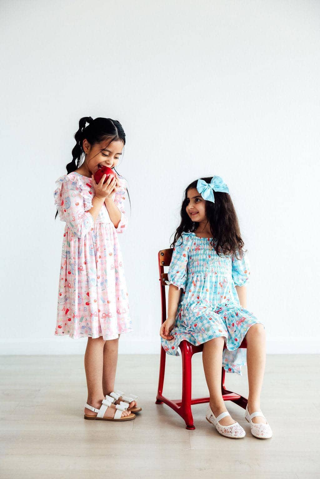 Girls pastel pink and blue school days girls ruffle dress with 3/4 sleeves, twirl style for young children