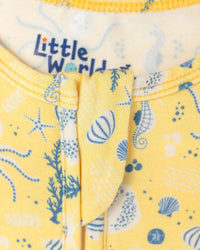 Yellow baby romper with blue sea creature print featuring seahorses and shells, made from soft bamboo fabric.