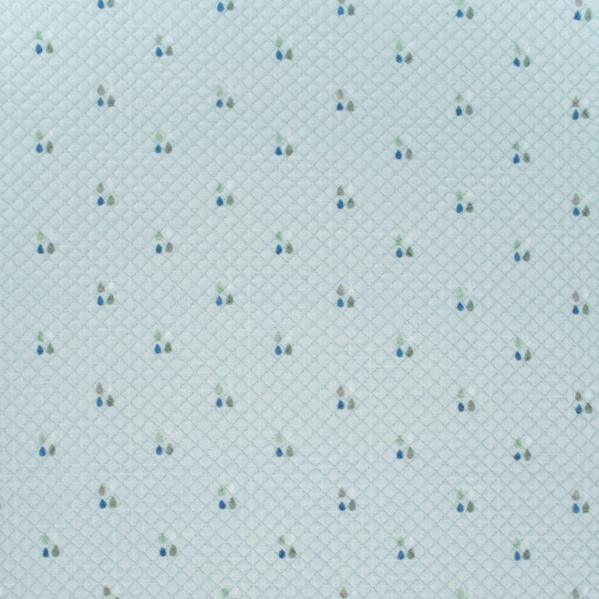Light blue Sealy baby knit blanket with small multicolor tree pattern made of soft knit fabric