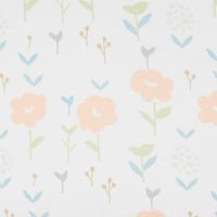 Toddler pouf seat for playroom with soft white fabric featuring pastel floral and leaf pattern