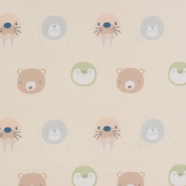 Close-up of beige toddler animal pouf seat fabric with brown bears, green penguins, and blue walruses pattern