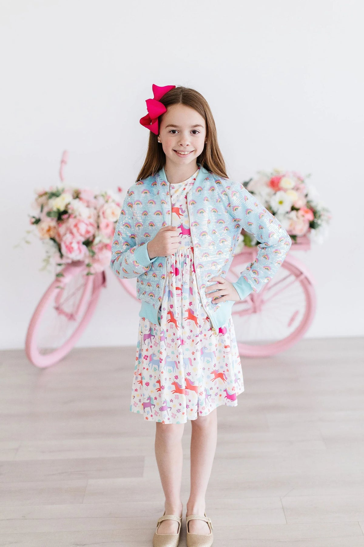 girls light blue sequin jacket with rainbow pattern, long sleeve, worn by young girl