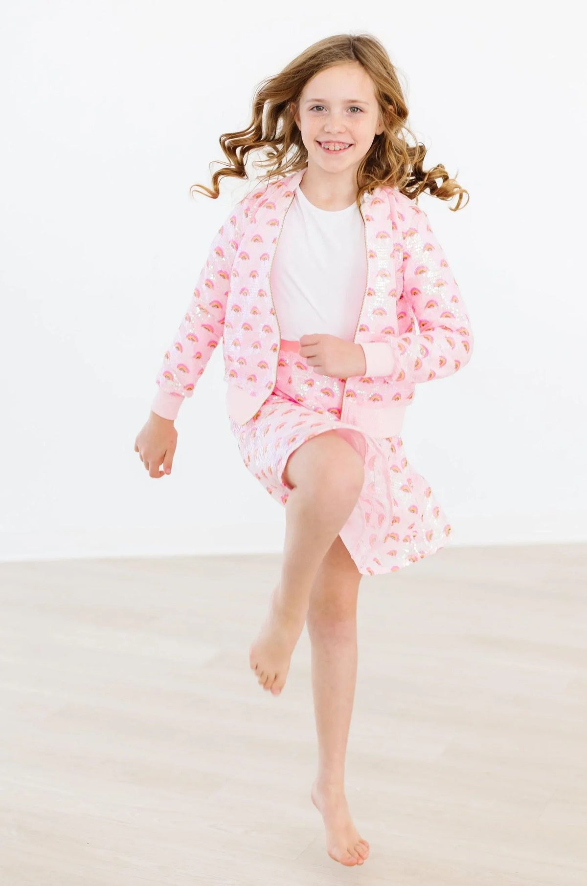girls pink sequin jacket by Mila & Rose with long sleeves and heart pattern